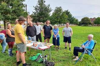 A community meeting a Copper's Green in Lockleaze