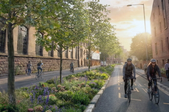 Image of sustainable urban environment with cyclists and wildflowers