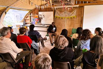 young people listening to a talk