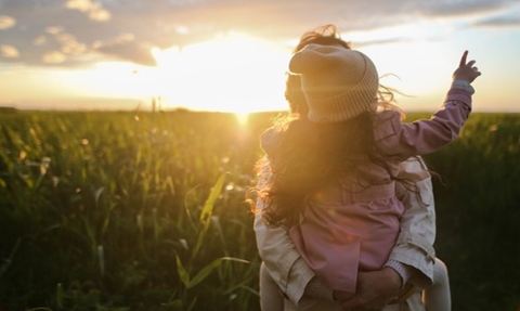 Piggy back at sunset