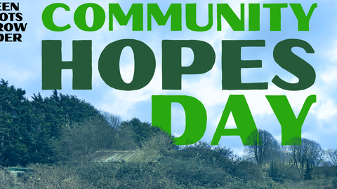 The words 'Green Shoots at Grow Wilder Community Hopes Day' on a blue sky background, and slightly hidden by a tree landscape 