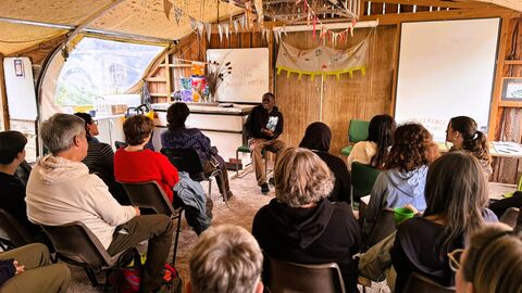 young people listening to a talk