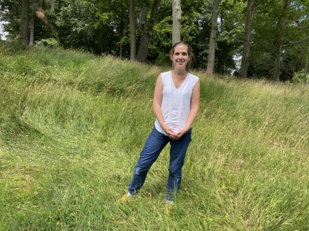 Jess David in longer grass for pollinators, Bath