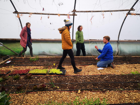 Grow Leader student in a polytunnel