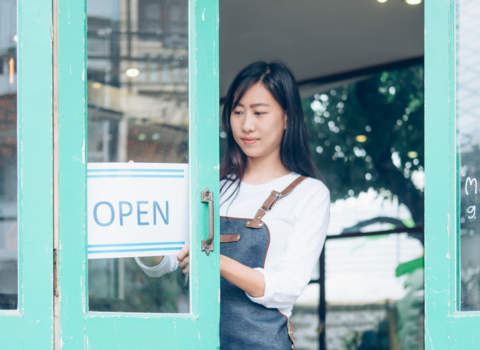 Business owner opening shop