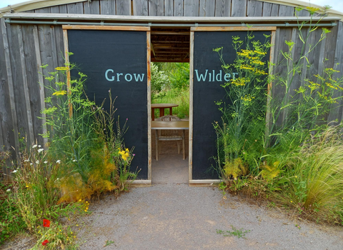 Grow Wilder sign