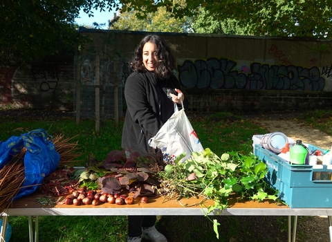 Staff member in community garden